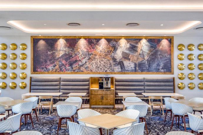 Imagen del bar/restaurante del Hotel Radisson Hotel & Convention Centre, Johannesburg, O.R. Tambo Airport. Foto 4