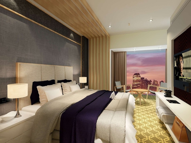 Imagen de la habitación del Hotel Radisson Lucknow City Center. Foto 7
