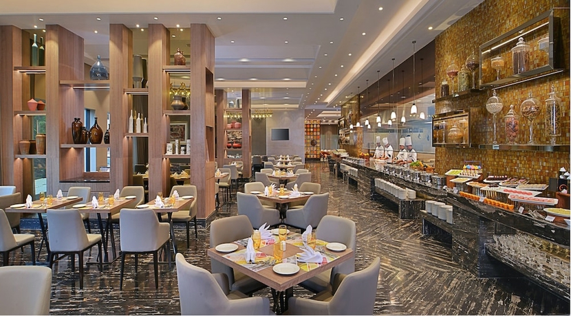 Imagen del bar/restaurante del Hotel Radisson Mumbai Andheri Midc. Foto 6