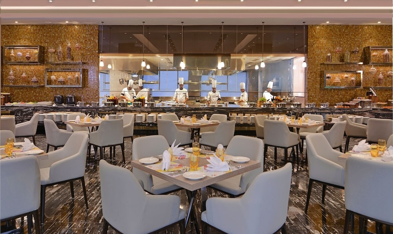 Imagen del bar/restaurante del Hotel Radisson Mumbai Andheri Midc. Foto 8