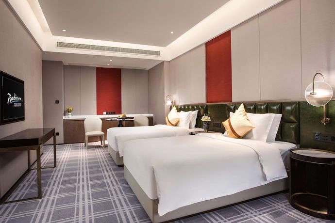 Imagen de la habitación del Hotel Radisson Ningbo Beilun. Foto 10
