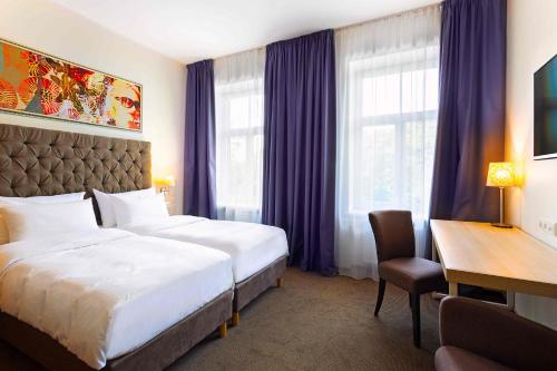 Imagen de la habitación del Hotel Radisson Old Town Riga. Foto 13