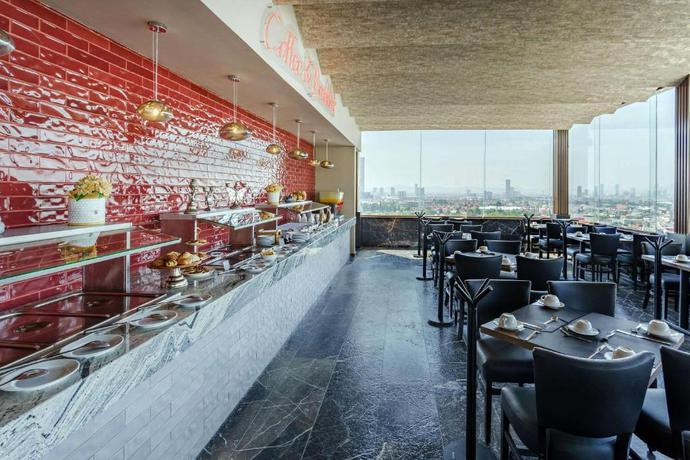 Imagen del bar/restaurante del Hotel Radisson Puebla Angelopolis. Foto 8