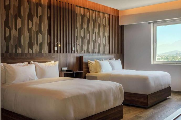 Imagen de la habitación del Hotel Radisson Puebla Angelopolis. Foto 10