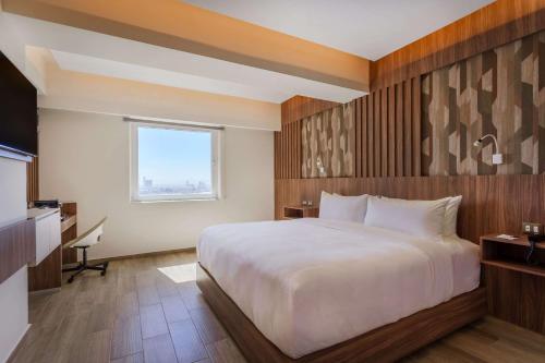 Imagen de la habitación del Hotel Radisson Puebla Angelopolis. Foto 11