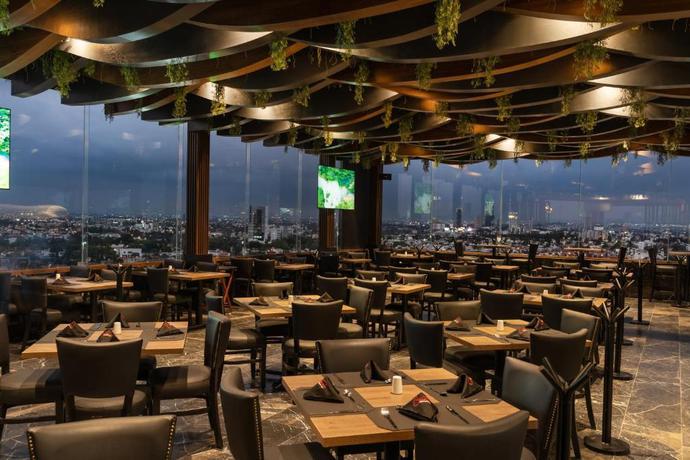 Imagen del bar/restaurante del Hotel Radisson Puebla Angelopolis. Foto 9