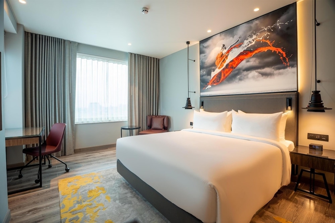 Imagen de la habitación del Hotel Radisson RED Indore. Foto 3