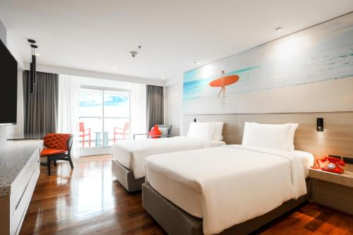 Imagen de la habitación del Hotel Radisson RED Phuket Patong Beach. Foto 14