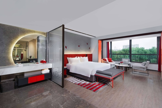 Imagen de la habitación del Hotel Radisson Red Beijing Universal Resort. Foto 7