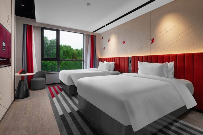 Imagen de la habitación del Hotel Radisson Red Beijing Universal Resort. Foto 10