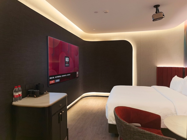 Imagen de la habitación del Hotel Radisson Red Beijing Universal Resort. Foto 11