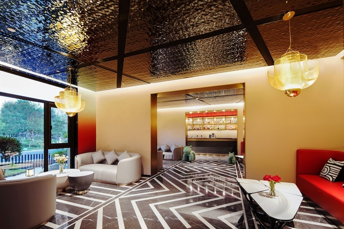 Imagen del bar/restaurante del Hotel Radisson Red Beijing Universal Resort. Foto 5