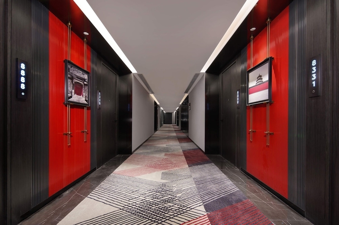 Imagen de los interiores del Hotel Radisson Red Beijing Universal Resort. Foto 19
