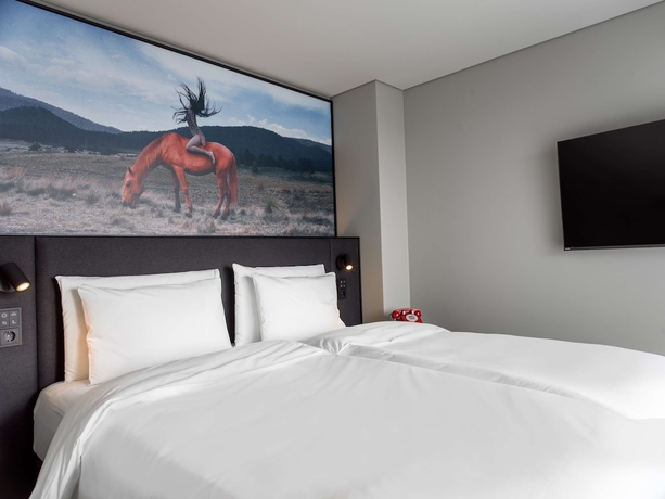 Imagen de la habitación del Hotel Radisson Red Helsinki. Foto 6