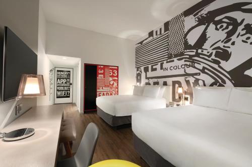 Imagen de la habitación del Hotel Radisson Red Minneapolis Downtown. Foto 17