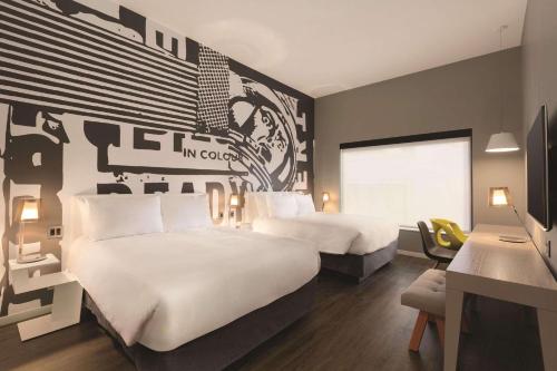 Imagen de la habitación del Hotel Radisson Red Minneapolis Downtown. Foto 18