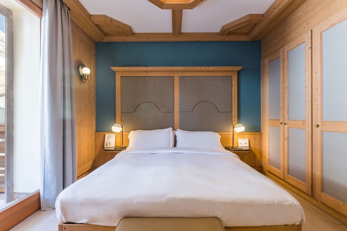Imagen de la habitación del Hotel Radisson Residences Savoia Palace Cortina D'ampezzo. Foto 2