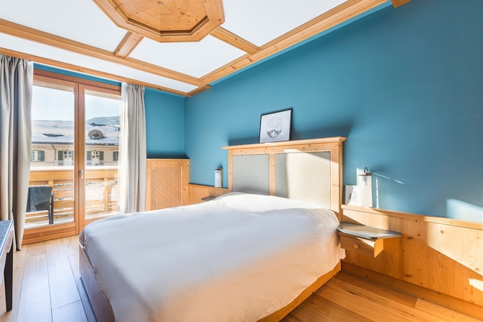 Imagen de la habitación del Hotel Radisson Residences Savoia Palace Cortina D'ampezzo. Foto 12