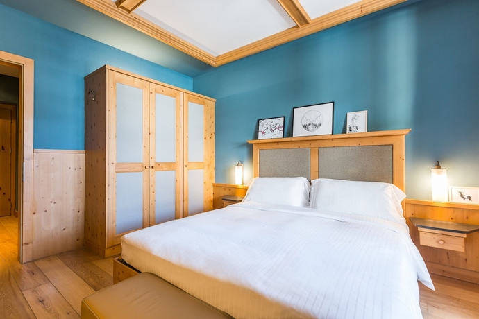 Imagen de la habitación del Hotel Radisson Residences Savoia Palace Cortina D’ampezzo. Foto 7