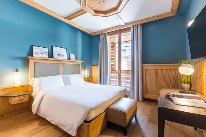 Imagen de la habitación del Hotel Radisson Residences Savoia Palace Cortina D’ampezzo. Foto 11