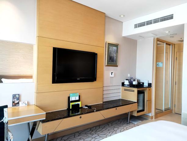 Imagen de la habitación del Hotel Radisson Tianjin Aqua City. Foto 5