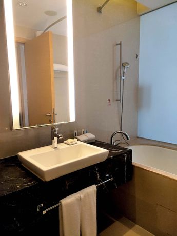 Imagen de la habitación del Hotel Radisson Tianjin Aqua City. Foto 14