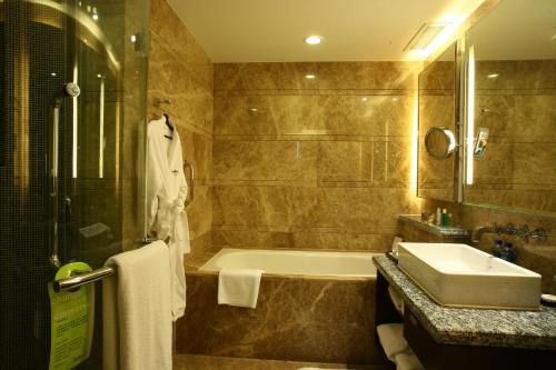 Imagen de la habitación del Hotel Radisson Tianjin. Foto 7