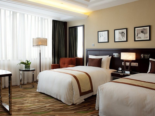 Imagen de la habitación del Hotel Radisson Tianjin. Foto 8