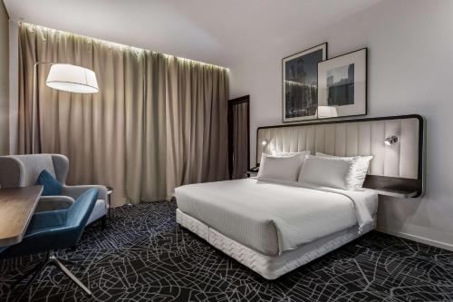 Imagen de la habitación del Hotel Radisson and Apartments Dammam Industry City. Foto 13