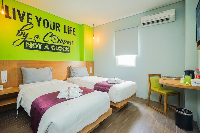 Imagen de la habitación del Hotel Radja Art and Boutique Simpang Lima. Foto 8
