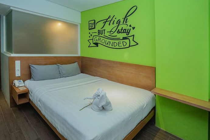 Imagen de la habitación del Hotel Radja Art and Boutique Simpang Lima. Foto 9