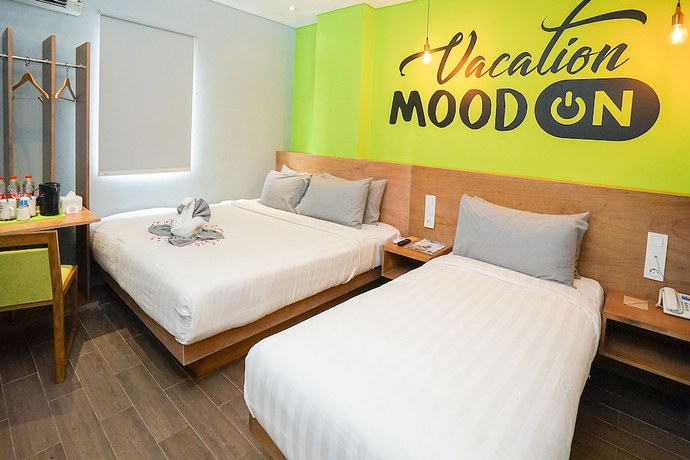 Imagen de la habitación del Hotel Radja Art and Boutique Simpang Lima. Foto 11