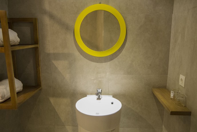 Imagen de la habitación del Hotel Radja Art and Boutique Simpang Lima. Foto 14