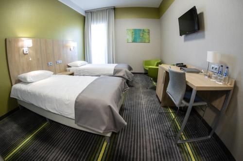 Imagen de la habitación del Hotel Radocza Park Business. Foto 6