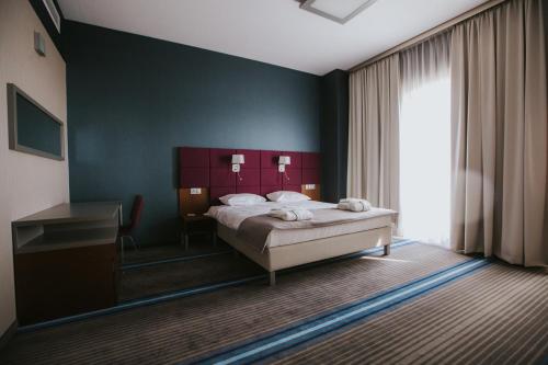Imagen de la habitación del Hotel Radocza Park Business. Foto 8