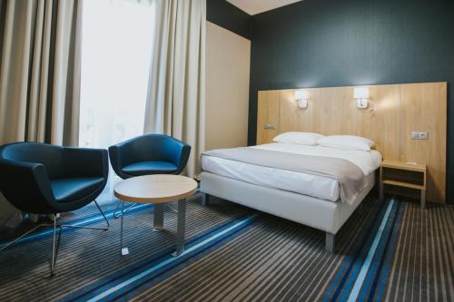 Imagen de la habitación del Hotel Radocza Park Business. Foto 9
