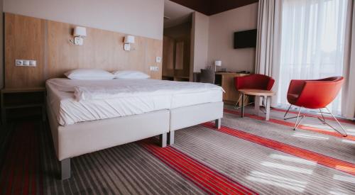 Imagen de la habitación del Hotel Radocza Park Business. Foto 10