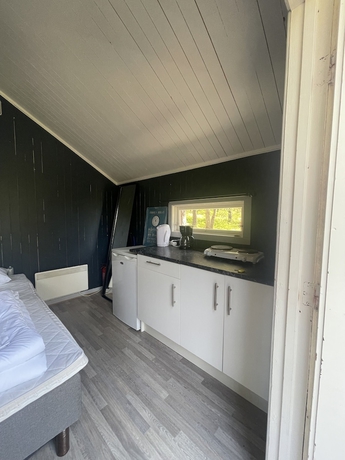 Imagen de la habitación del Hotel Raet Camping. Foto 19