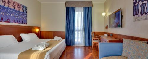 Imagen de la habitación del Hotel Raffaello, Mil&aacute;n. Foto 9