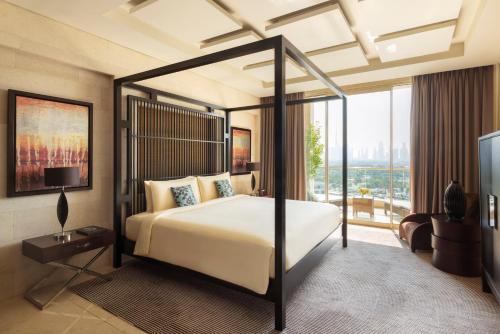 Imagen de la habitación del Hotel Raffles Dubai. Foto 12