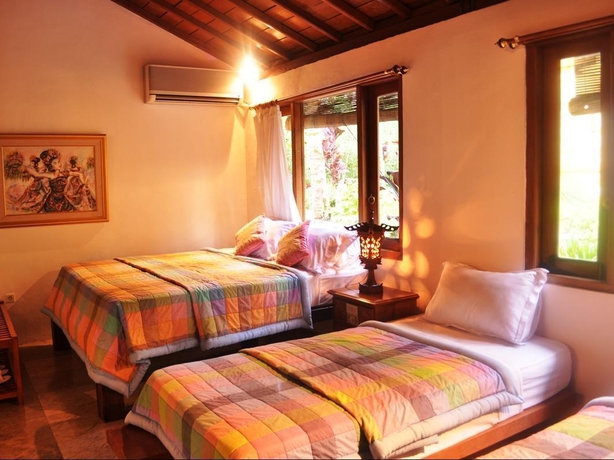 Imagen de la habitación del Hotel Raffles Holiday. Foto 4