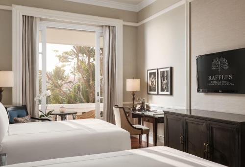 Imagen de la habitación del Hotel Raffles Le Royal. Foto 11