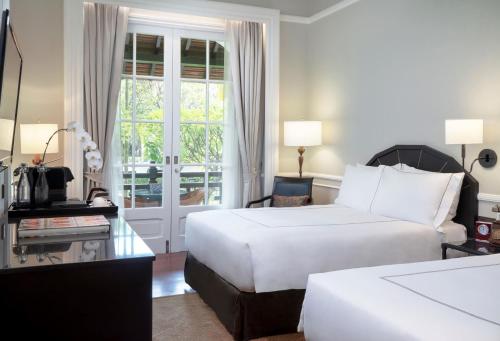 Imagen de la habitación del Hotel Raffles Le Royal. Foto 14