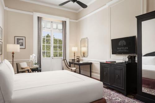 Imagen de la habitación del Hotel Raffles Le Royal. Foto 15