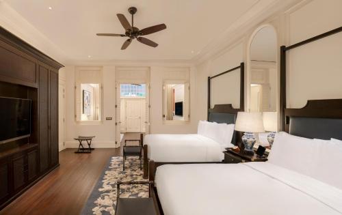 Imagen de la habitación del Hotel Raffles Singapore. Foto 11