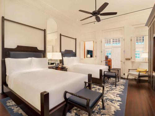 Imagen de la habitación del Hotel Raffles Singapore. Foto 20