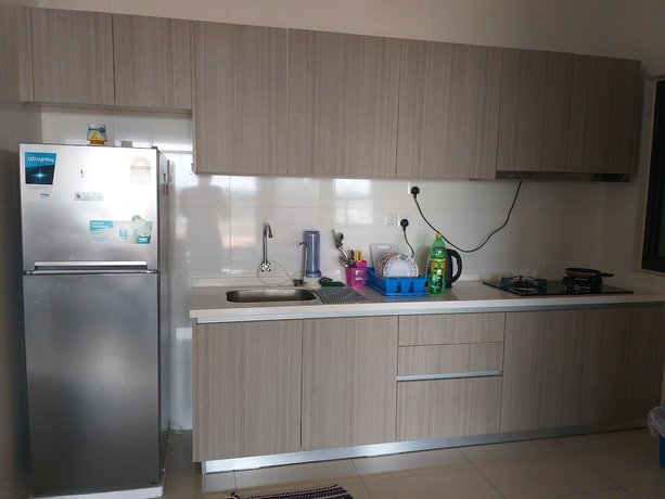 Imagen de la habitación del Hotel Raffles Suites Homestay. Foto 9