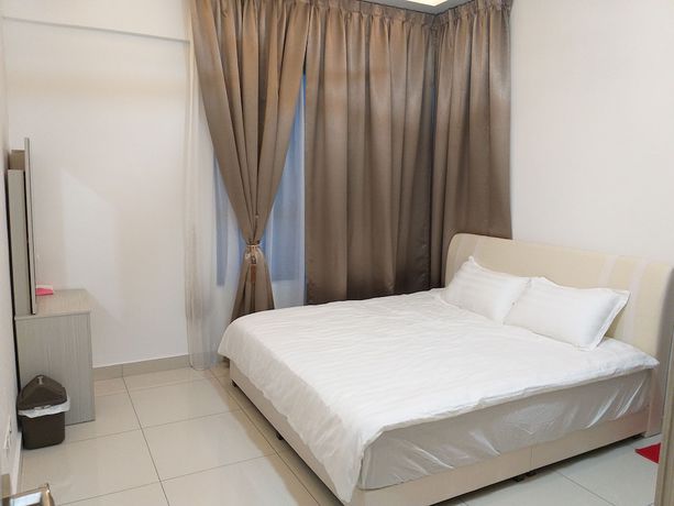 Imagen de la habitación del Hotel Raffles Suites Homestay. Foto 17