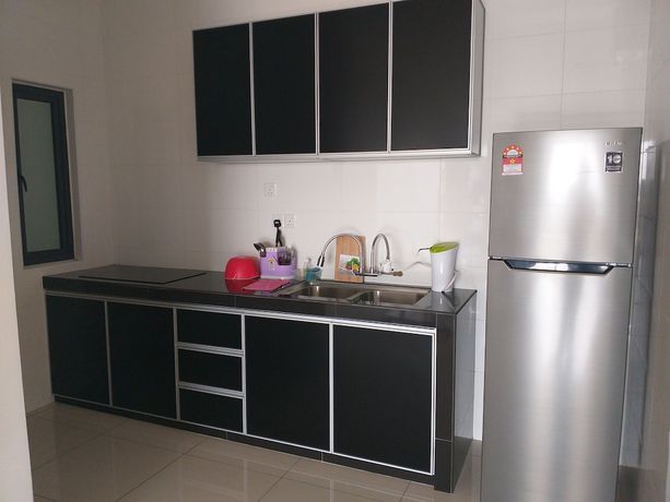 Imagen de la habitación del Hotel Raffles Suites Homestay. Foto 18