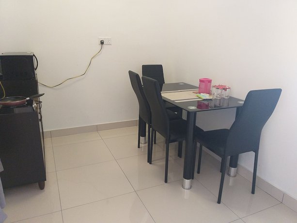 Imagen de la habitación del Hotel Raffles Suites Homestay. Foto 19